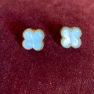 Earrings i.e. Van Cleef & Arpels